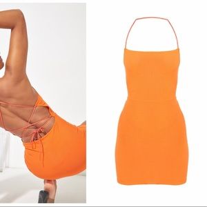 Orange lace up back mini dress